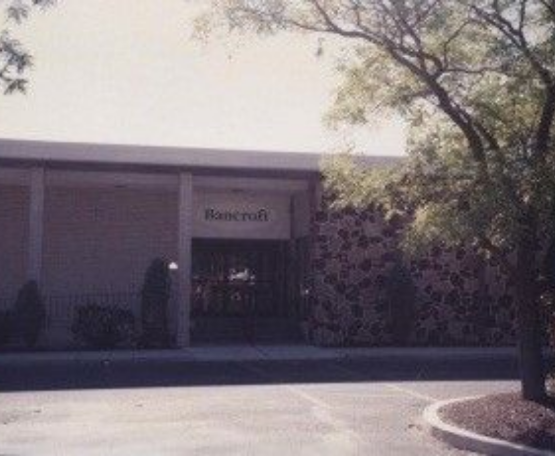 An old Bancroft campus building; a gray and red tiled building