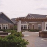 A Bancroft campus with multiple gray buildings in a