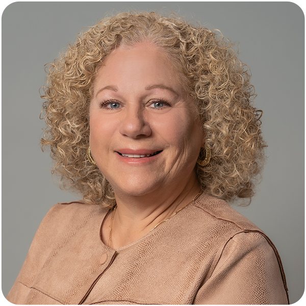 Bancroft's Chief Strategy Officer Judi London's headshot while smiling