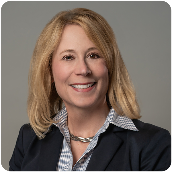 Bancroft's Chief Development Officer Susan Piergallini's headshot with a smile and dark colored blazer jacket