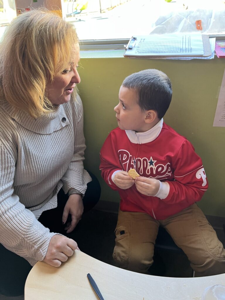 Principal Lisa Scarangelli with student