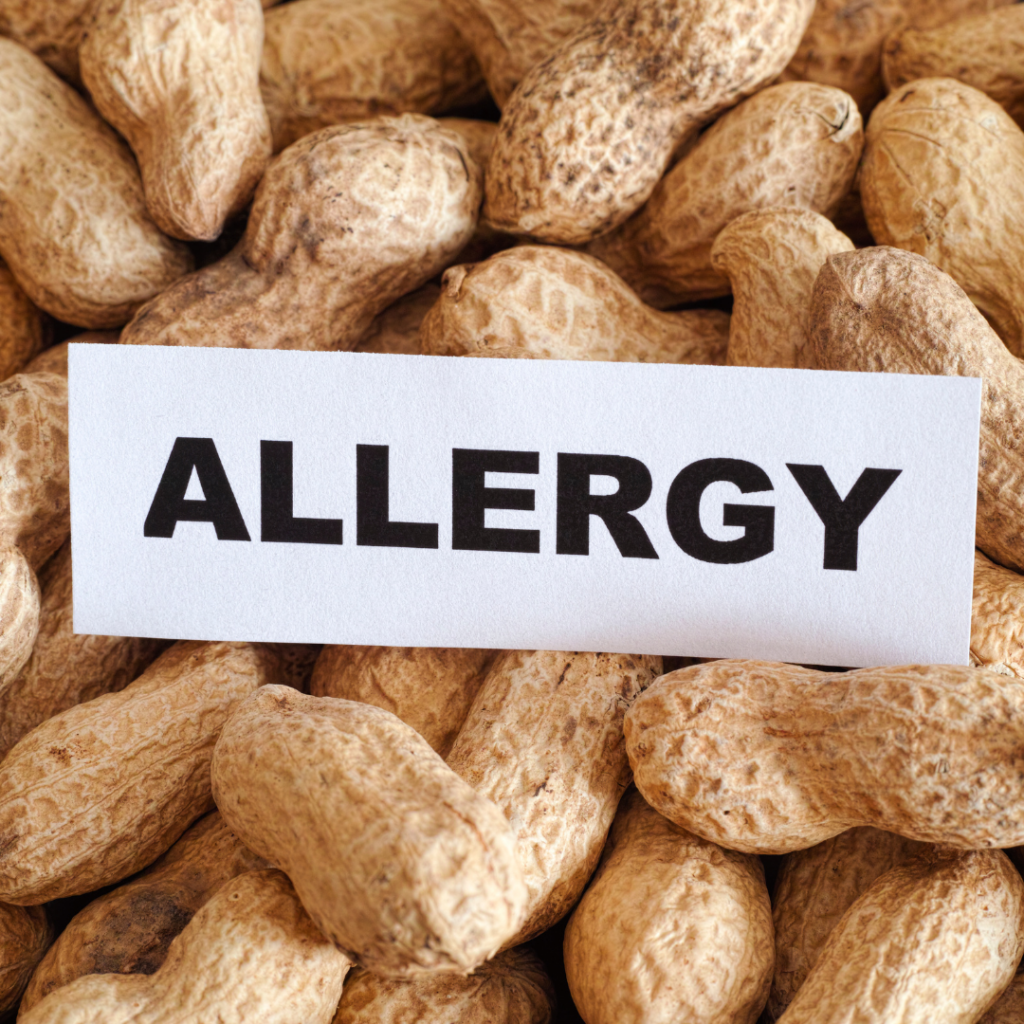 Peanuts with the word 'allergy' written over them