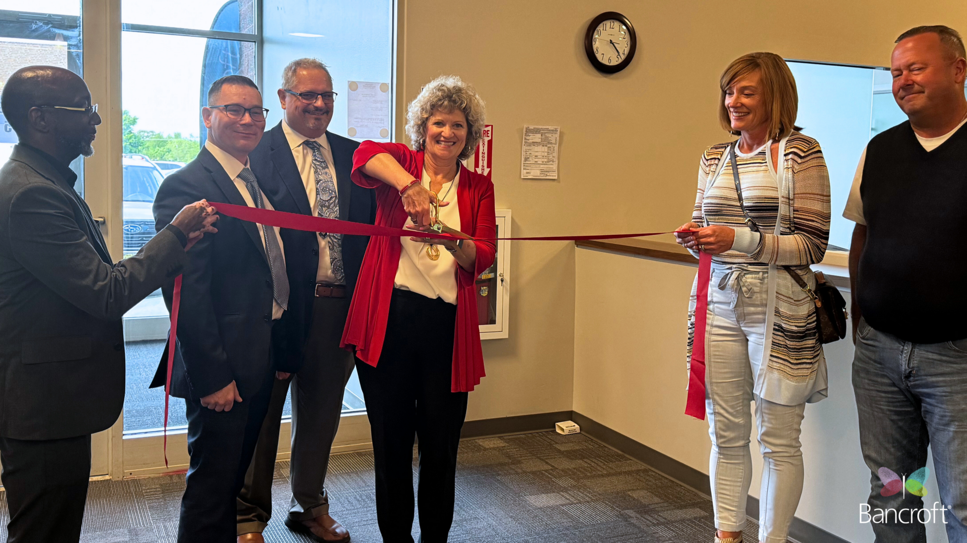 Ceremonial cutting of the ribbon at the new facility