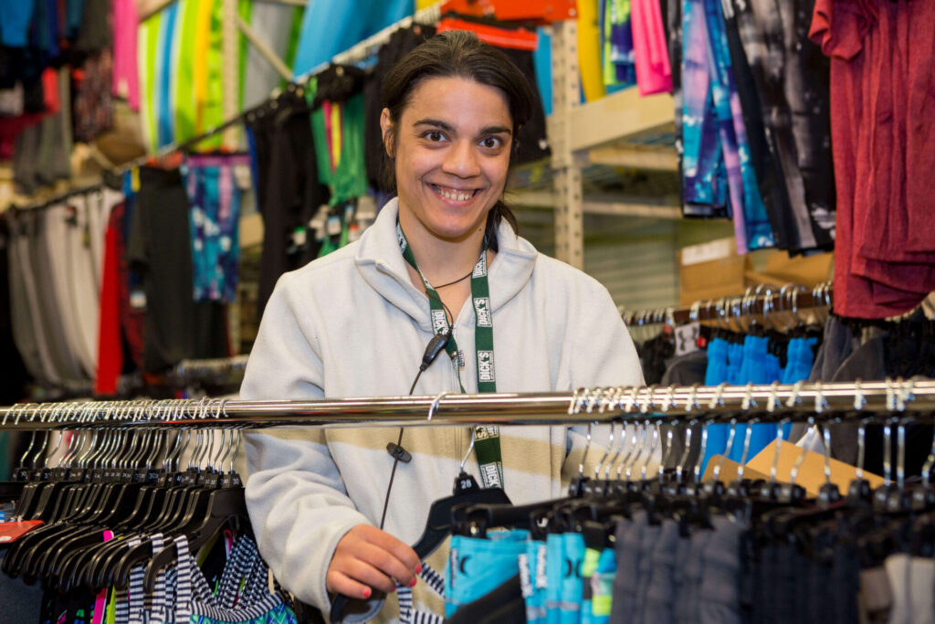 Adult working at a sporting good store