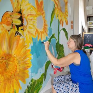 Jeanne Bozicek painting mural