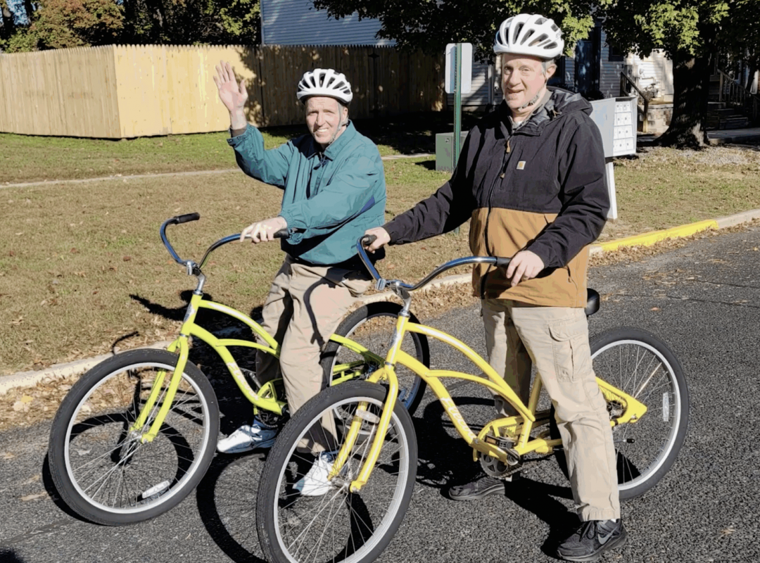 picture of Adam and Eric riding bikes together
