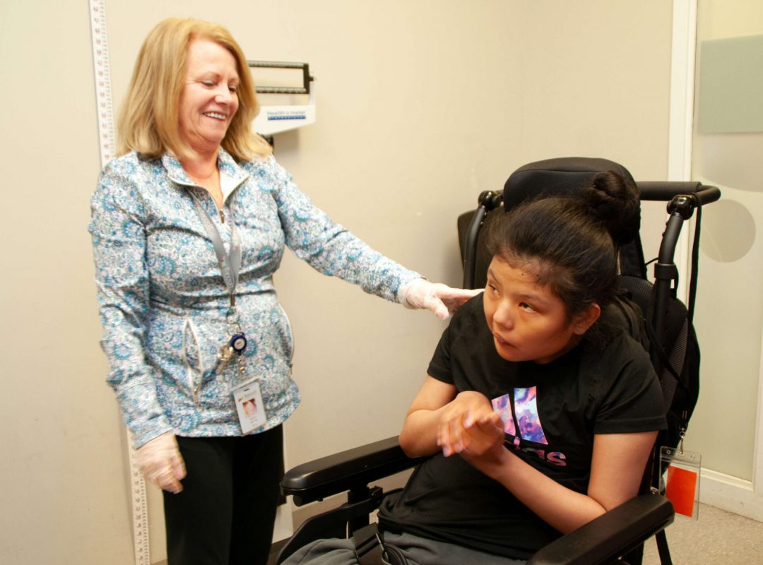 Bancroft Nurse with female patient using a wheelchair