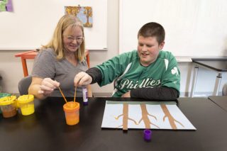 Male individual with female therapist